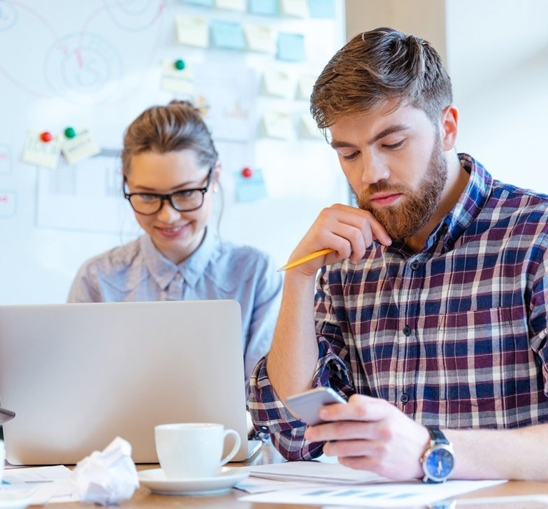 people-working-in-office-P3DBYE3-784x729