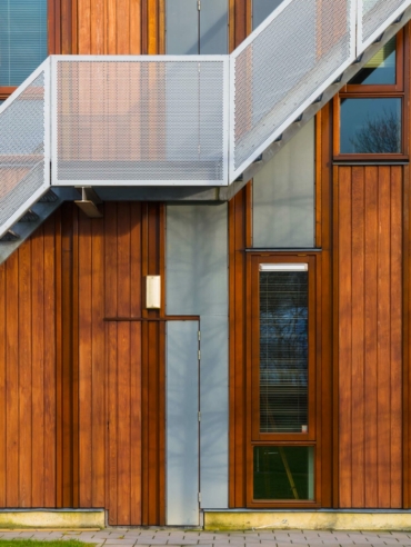 Escape stairs on a modern sustainable wooden office facade