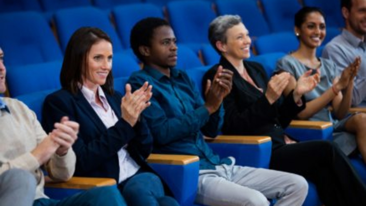 business-executives-applauding-business-meeting-437x288