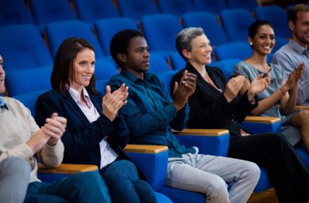 business-executives-applauding-business-meeting-437x288