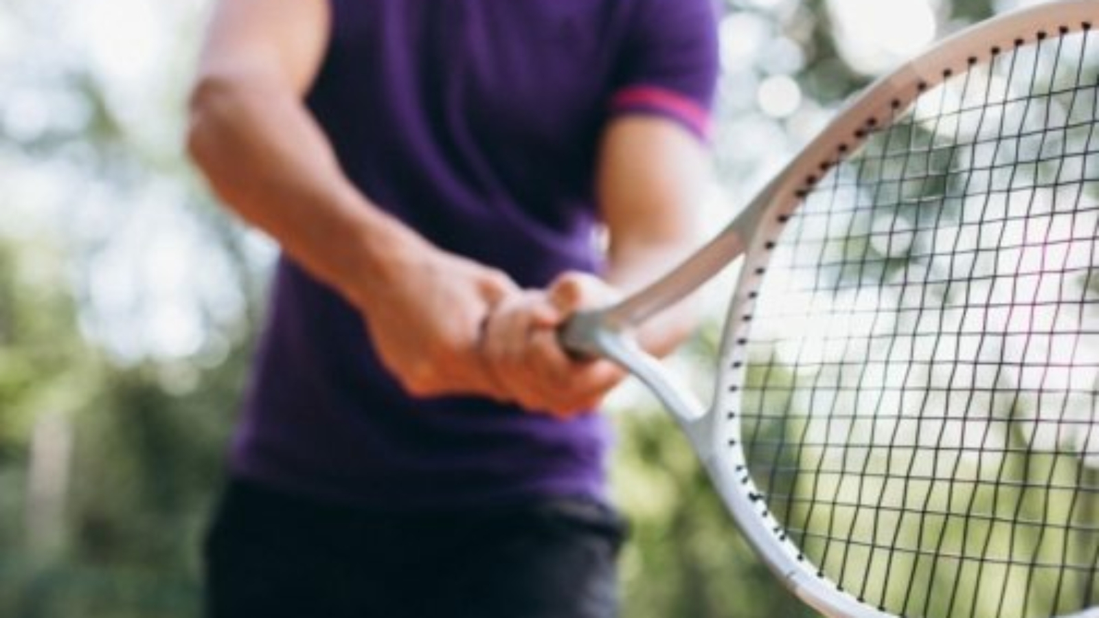 young-man-tennis-player-court-tennis-racket-close-up3-503x503